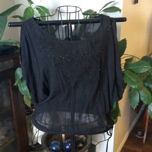 Black cold-shouldered beaded top